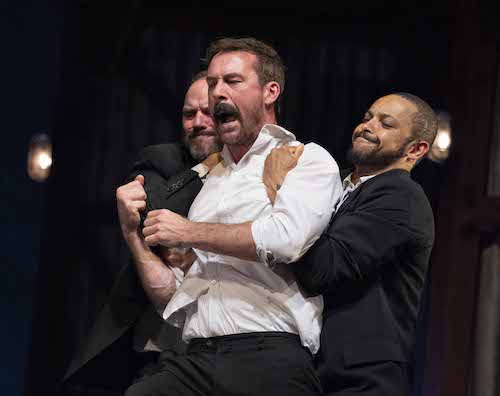 Yosser (Barry Sloane) being restrained in Boys from the Black Stuff