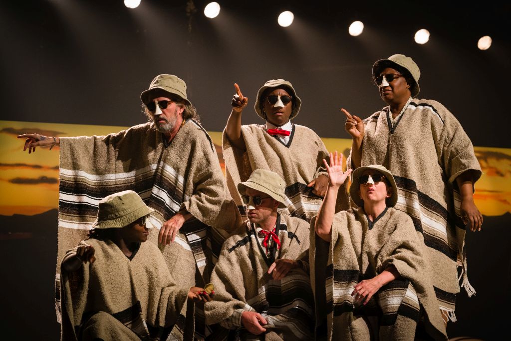 A gathering of poncho-wearers in 'Bagdad Cafe'